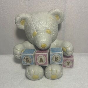 vintage ceramic teddy bear figurine from the 1980s produced by Gund